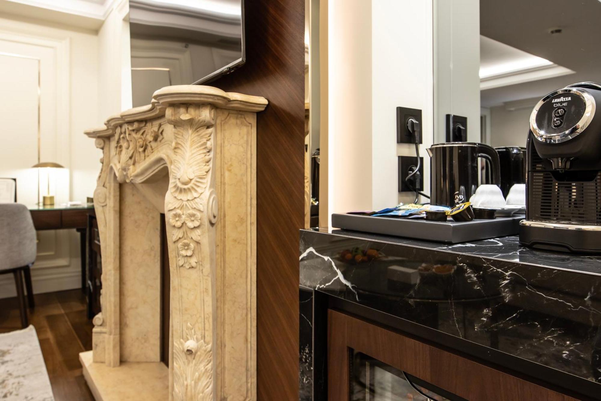 Xheko Imperial Luxury Hotel & Spa Tirana Exterior foto A Nespresso machine in a hotel room